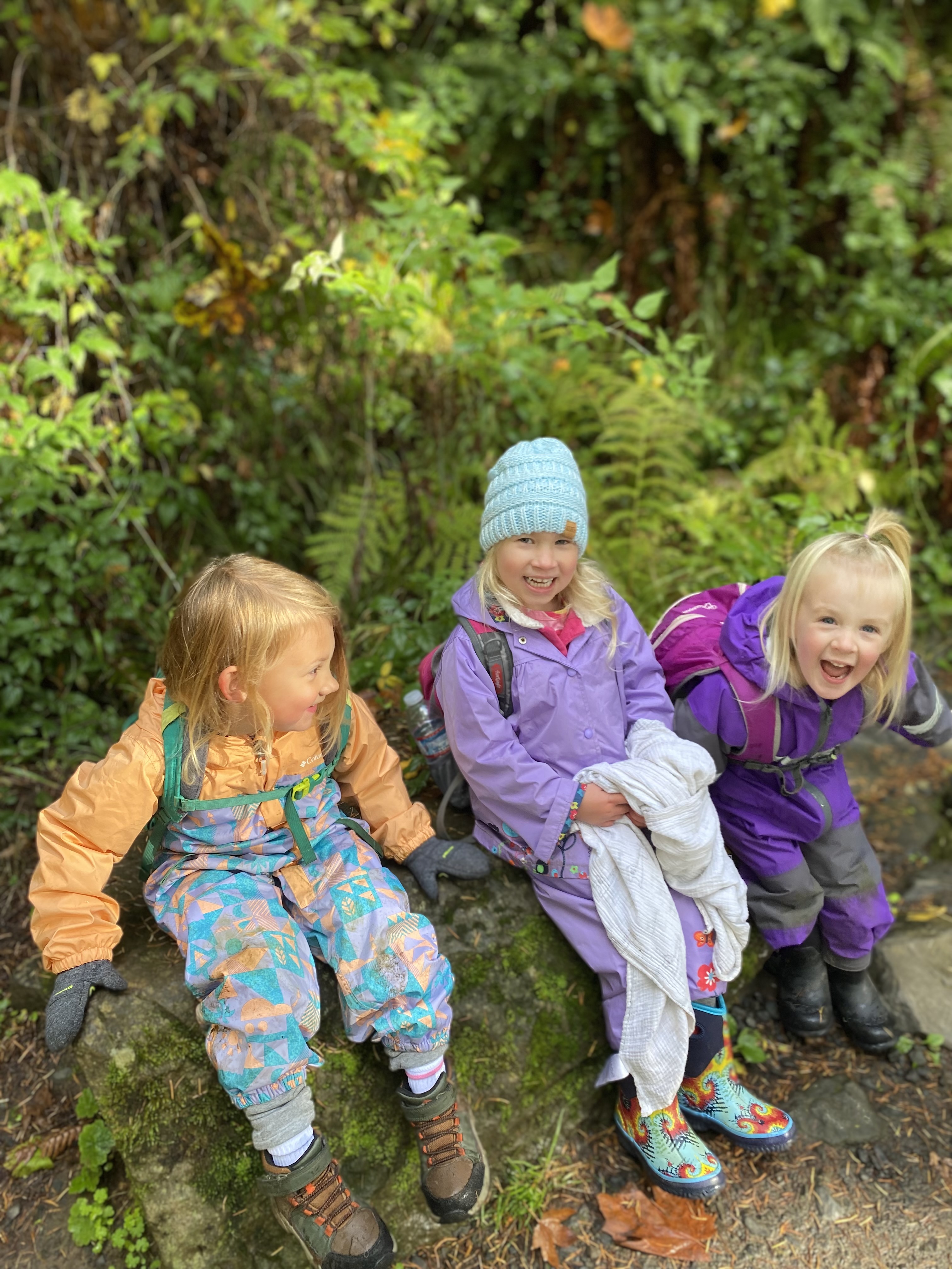 Nature-based preschool students exploring at Oregon Outdoor Kids Forest Preschool in Eugene.